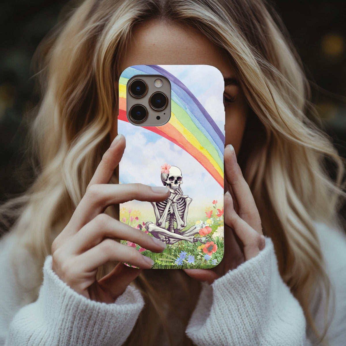 Woman taking a mirror selfie with the Rainbow Skeleton tough phone case