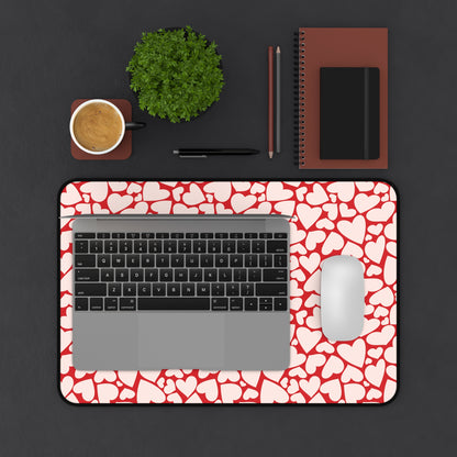 Laptop and mouse on the red hearts desk mat