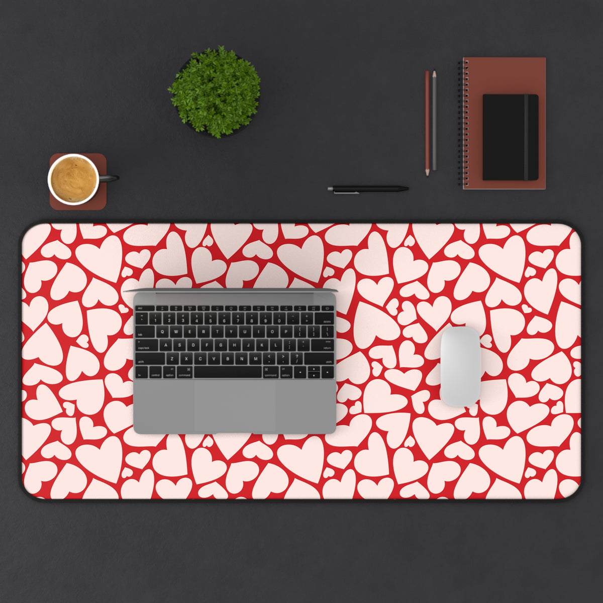 Extra large red hearts desk mat under a laptop and mouse