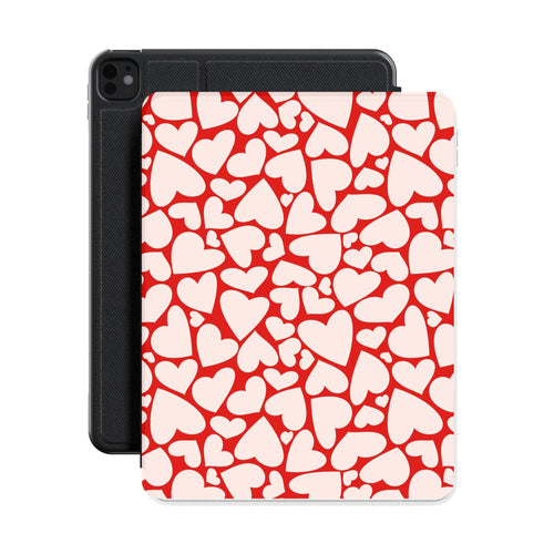 Red hearts iPad case shown with an iPad