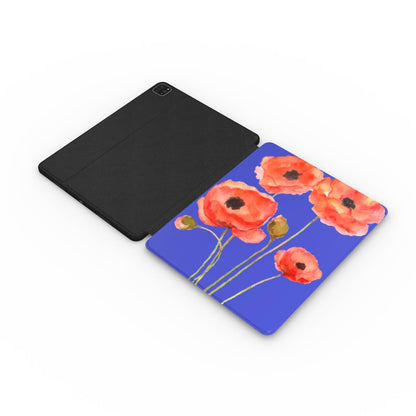 Red Poppies iPad case opened flat showing the printed front and black back