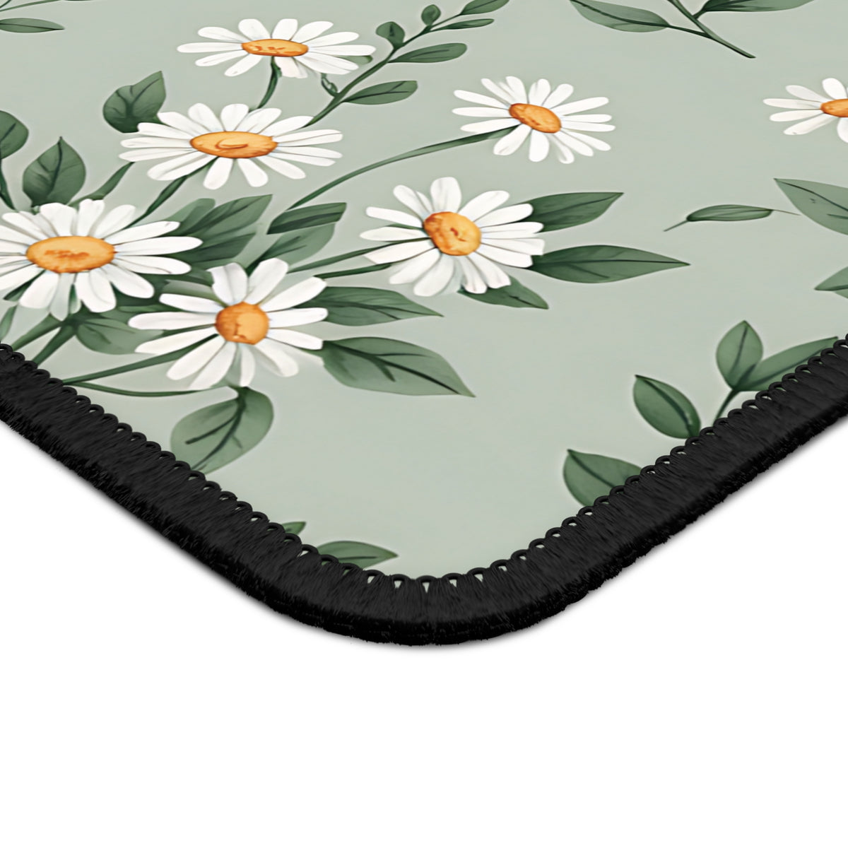 Close-up of the Sage Daisy mouse mat print and stitched edge