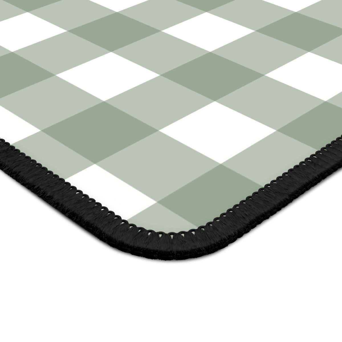 Close-up of the stitched edge on the Sage Gingham mouse mat