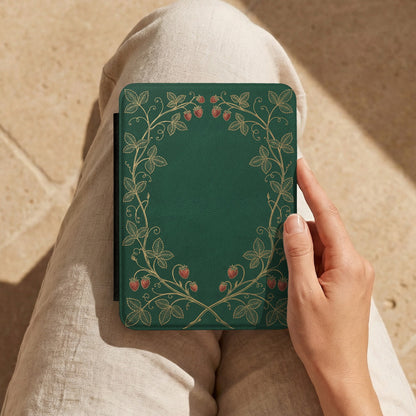 Strawberry Vine Kindle case held on a lap