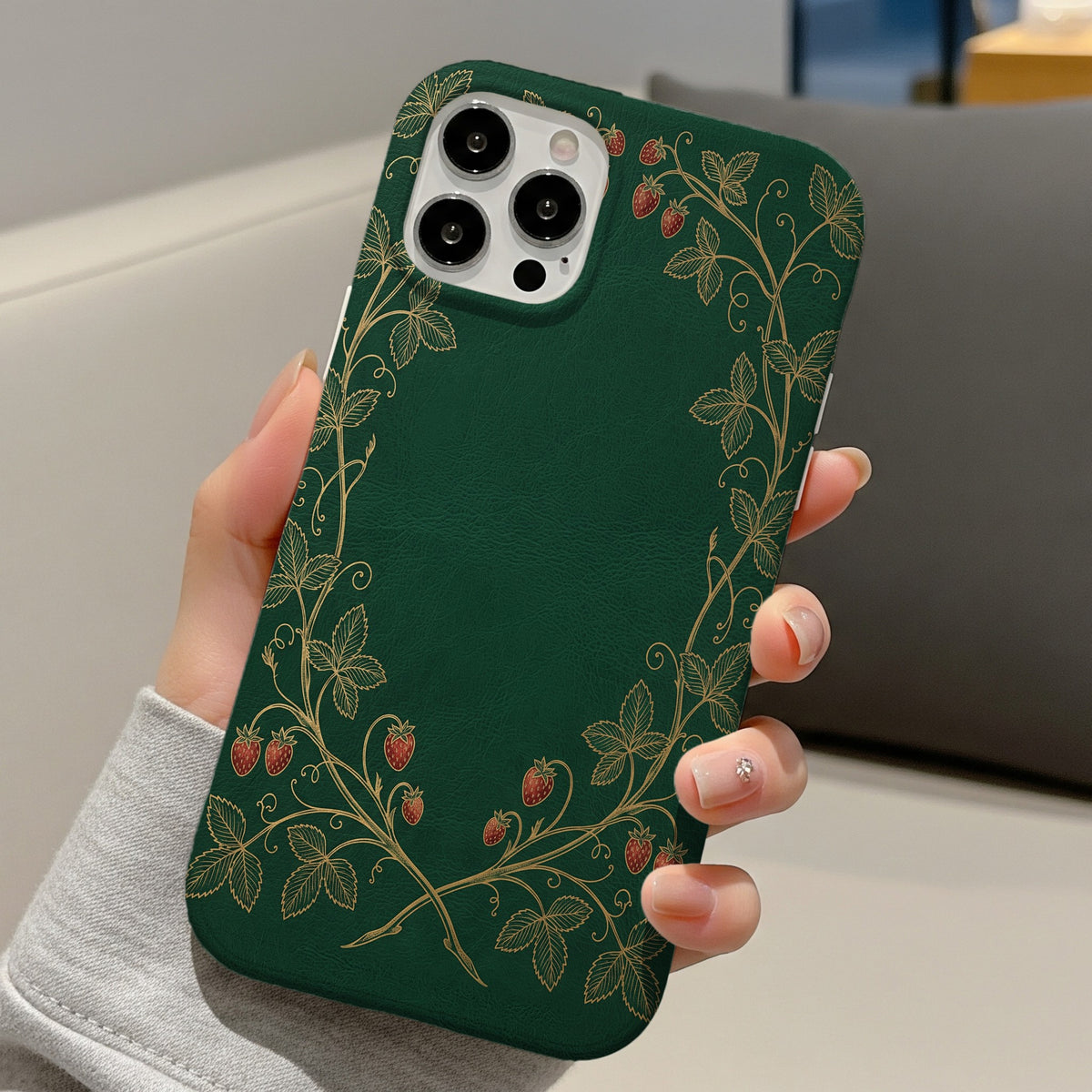 Strawberry Vine tough phone case held in hand