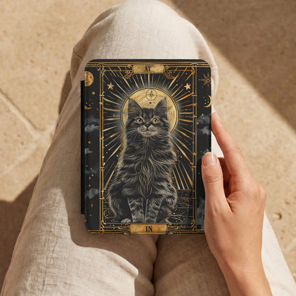 Tarot Cat Kindle case held on a lap while reading