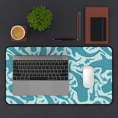Teal Whale Shark desk mat on a dark desk with a laptop and mouse