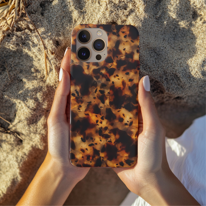 Tortoiseshell phone case lifestyle photo, warm amber tones