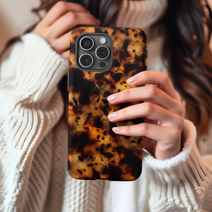 Tortoiseshell phone case in use, honey and espresso tortoiseshell pattern