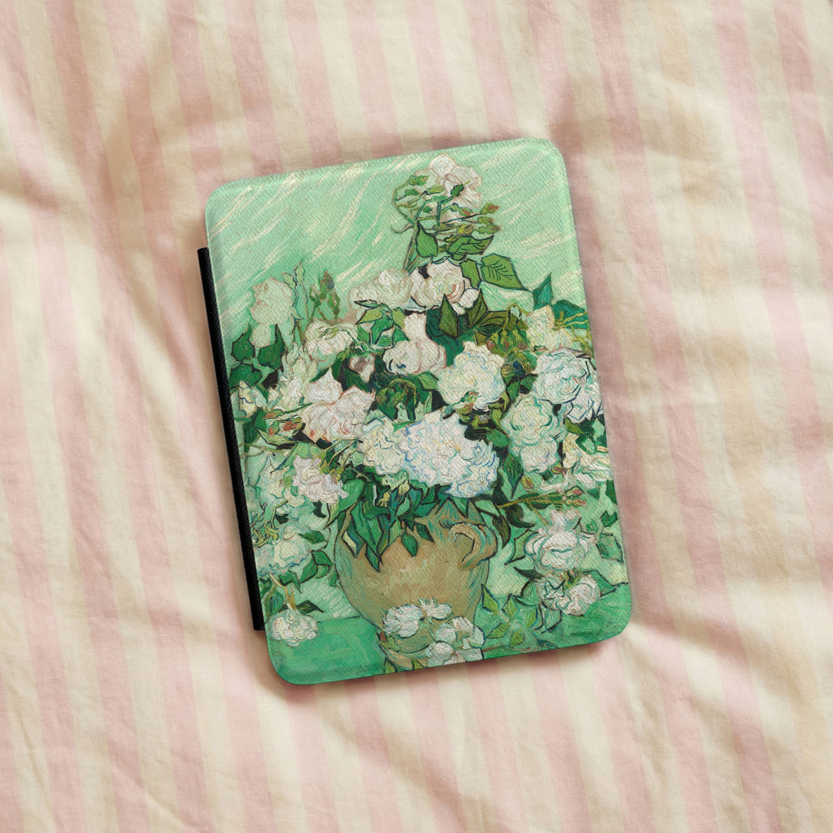 Van Gogh Roses Kindle case on pink striped linen bedding