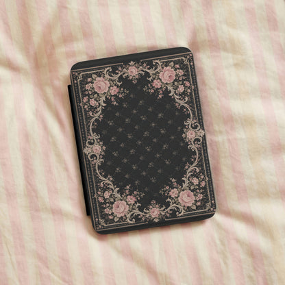 Victorian Rose Kindle case resting on pink striped linen bedding