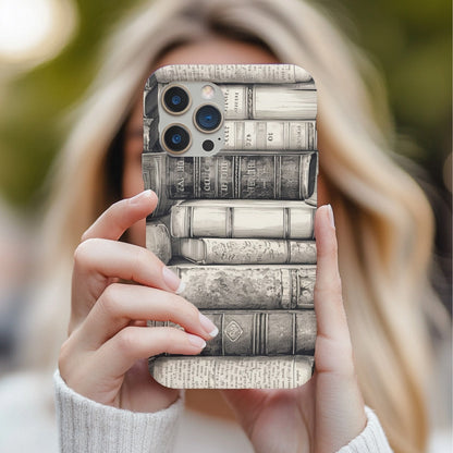 Woman holding a Vintage Books tough phone case