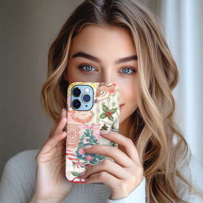 Vintage Christmas tough phone case held up next to the face