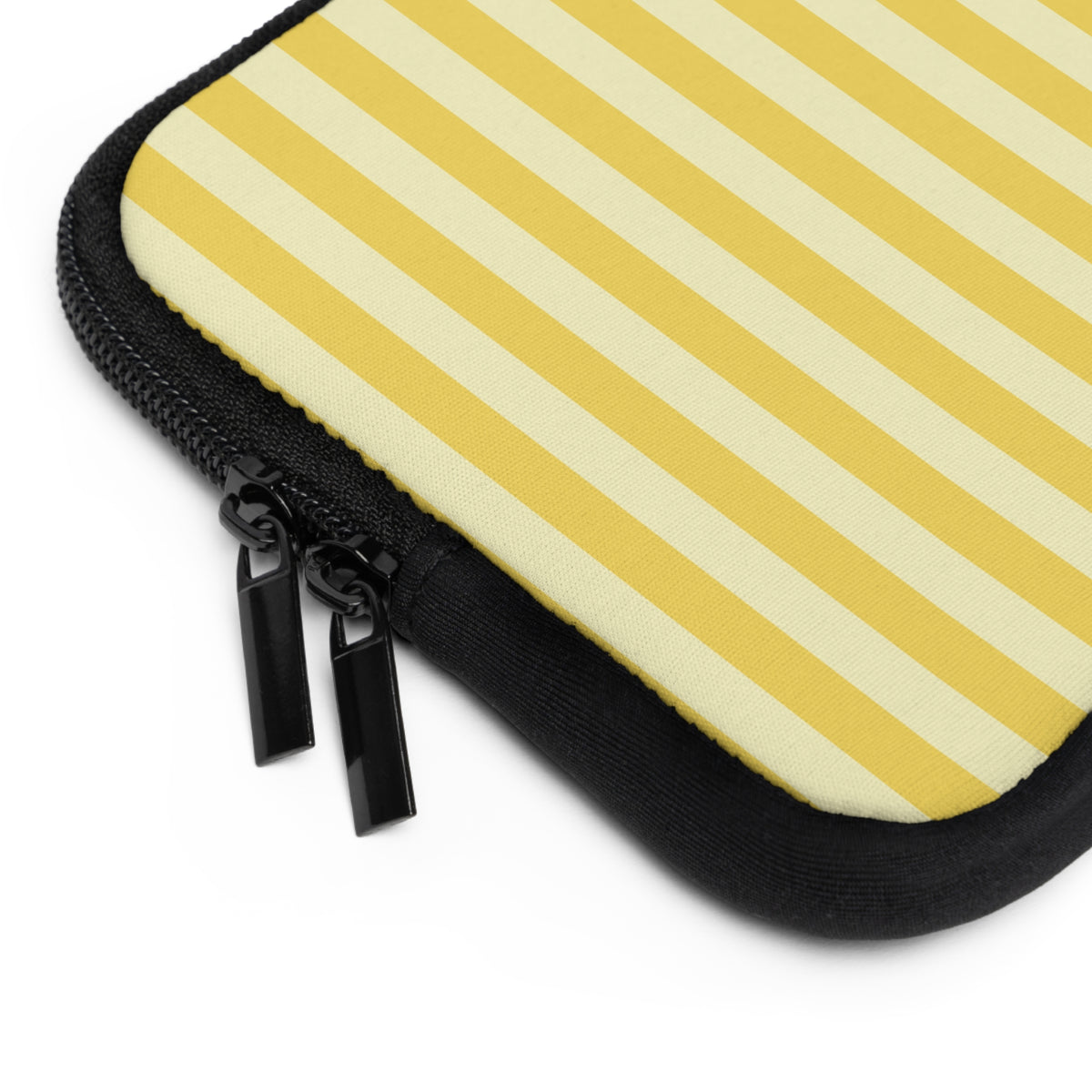 Close-up of the zipper and edge of the Yellow Cabana Stripe laptop sleeve